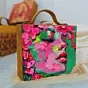 Women Pink And Green Portrait Printed Suitcase Style Clutch