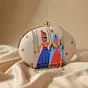 Women Indian Puppet Printed Oval Clutch