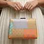 Women Multipattern Yellow Brocade Party Clutch