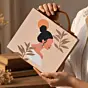 Women Black Bun Woman Printed Suitcase Style