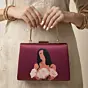 Women Maroon Based Floral Girl Portrait Printed Clutch