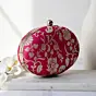Women Magenta Pink Based Silver Floral Pattern Brocade Fabric Oval Clutch