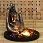Copper Finish Handcrafted Palm Buddha Decorative Showpiece with Wooden Base