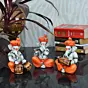 Orange Set of 3 Polyresin Ganesha Idol Playing Tabla, Flute and Dholak