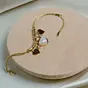 Women Love & Divinity Set: Radha Krishna Clutch & Hearts Charms Bracelet