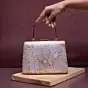 Woman White Based Golden Floral Brocade Fabric Clutch