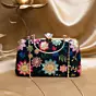 Woman Black Based Multicoloured Floral Embroidery Clutch