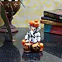 Orange Polyresin Lord Ganesha Playing Tabla Idol