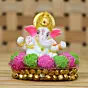 Golden and White Polyresin Lord Ganesha Idol on Decorative Pink and Green Flowers Plate