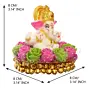 Golden and White Polyresin Lord Ganesha Idol on Decorative Pink and Green Flowers Plate