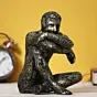 Golden and Black Polyresin Man Figurine Sitting in Thinking Position