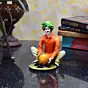 Polyresin Rajasthani Craftsman Statue Making Pot Handcrafted Decorative Showpiece(Orange and Green)