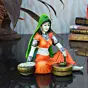 Polyresin Rajasthani Lady using Flour Machine Handcrafted Decorative Showpiece ( Orange, Green and Brown )