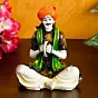 Colorful Rajasthani Man Playing Musical Instrument Handcrafted Decorative Polyresin Showpiece