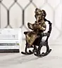 Brown Brass Lord Ganesha Idol On Rocking Chair Showpiece