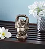 Standing Laughing buddha statue holding a gold ingot, with his hands upright