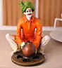 Polyresin Rajasthani Craftsman Statue Making Pot Handcrafted Decorative Showpiece(Orange and Green)