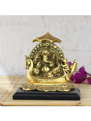 Golden Lord Ganesha sitting on Swan Throne