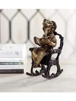 Brown Brass Lord Ganesha Idol On Rocking Chair Showpiece