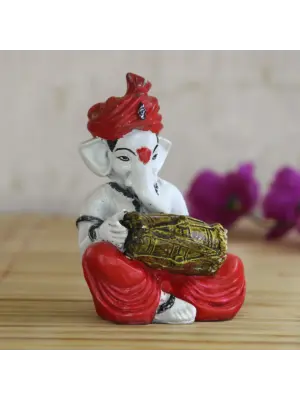 Lord Ganesha Idol Playing Dholak Musical Instrument