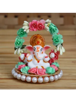Lord Ganesha Idol On Decorative Handicrafted Plate With Throne Of Pink And Green Flowers