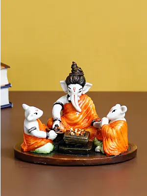 Orange and White Polyresin Handcrafted Lord Ganesha Idol Doing Havan with 2 Mushaks
