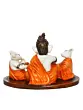 Orange and White Polyresin Handcrafted Lord Ganesha Idol Doing Havan with 2 Mushaks