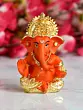 Gold Plated Orange Polyresin Ganesha Idol for Home, Temple, Office and Car Dashboard
