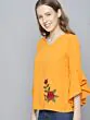 Women Mustard Solid Top with Embroidered Detail