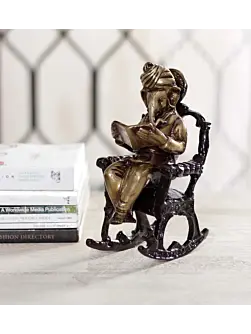 Brown Brass Lord Ganesha Idol On Rocking Chair Showpiece