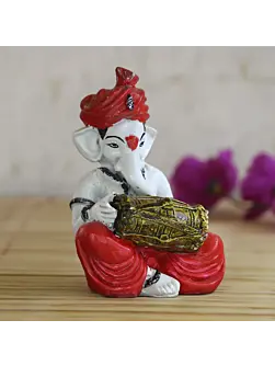 Lord Ganesha Idol Playing Dholak Musical Instrument