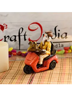 Polyresin Lord Ganesha Idol riding Scooter (Red and Yellow)