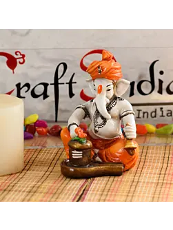 Orange Polyresin Lord Ganesha Idol Worshipping Lord Shiv Pooja