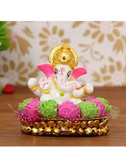 Golden and White Polyresin Lord Ganesha Idol on Decorative Pink and Green Flowers Plate