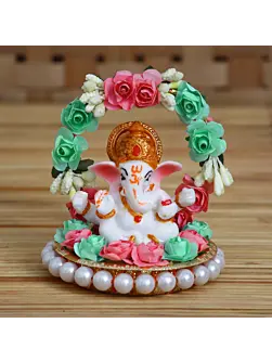 Lord Ganesha Idol On Decorative Handicrafted Plate With Throne Of Pink And Green Flowers