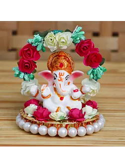 Polyresin Lord Ganesha Idol on Decorative Handcrafted Plate with Throne of Colorful Flowers