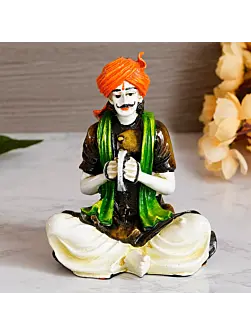 Colorful Rajasthani Man Playing Musical Instrument Handcrafted Decorative Polyresin Showpiece