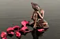 Brown Metal Resting Buddha On Knee Statue