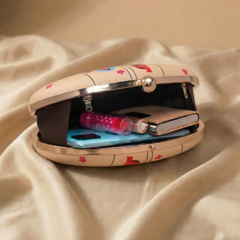Women Indian Puppet Printed Oval Clutch
