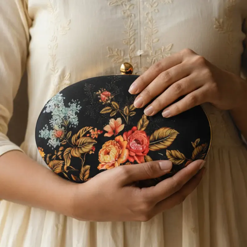 Women Yellow And Red Floral Printed Oval Clutch