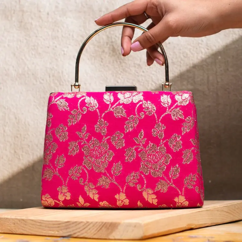 Woman Pink And Golden Brocade Fabric Clutch