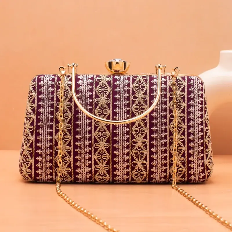Woman Wine Based White And Golden Threadwork Embroidery Clutch