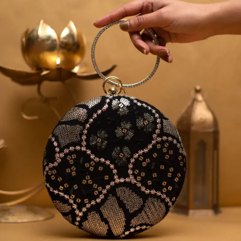 Women Black And Golden Round Embroidery Clutch