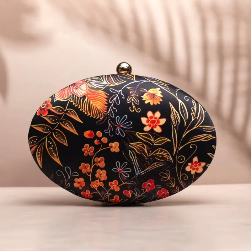 Woman Orange Floral And Leaves Printed Oval Clutch