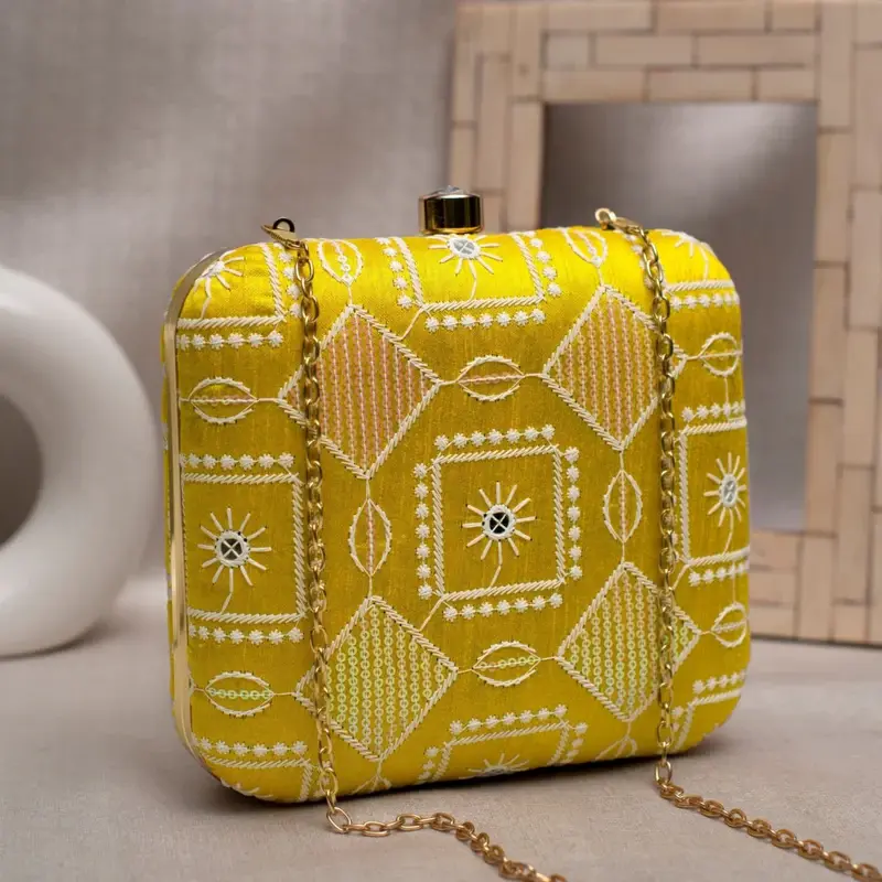 Woman Yellow And White Thread Embroidery Clutch