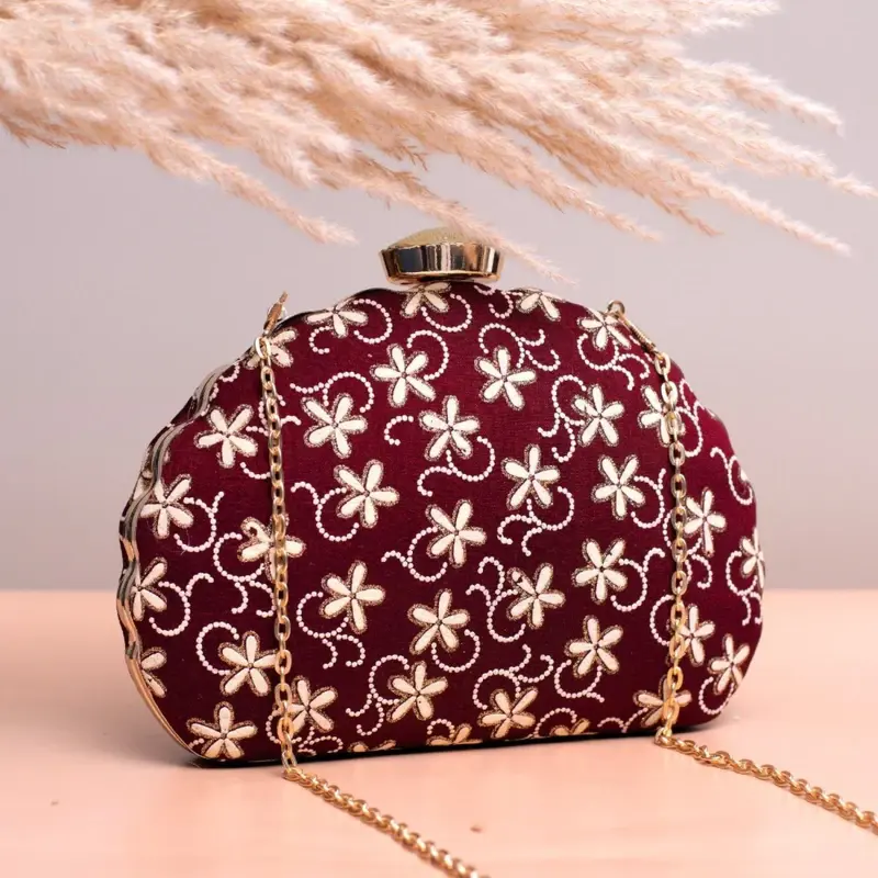 Women Maroon Based White Floral Embroidery Clutch