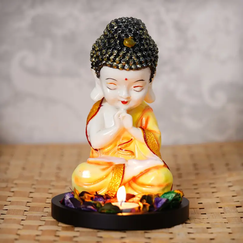Polyresin Yellow and White Praying Monk Buddha Idol with Wooden Base, Fragranced Petals and Tealight