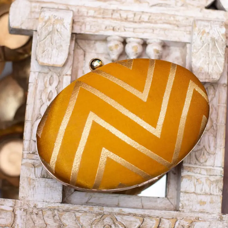 Women Golden Zig-Zag Mustard Base Clutch