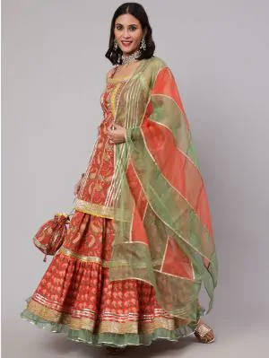 Red & Green Floral Printed Lace Work Kurta & Skirt With Organza Dupatta & Potali Bag